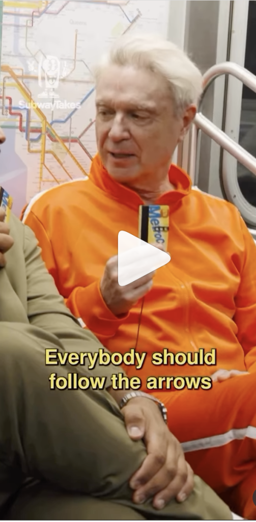 Musician David Byrne on Kareem Rahma's Subway Takes wearing an orange tracksuit