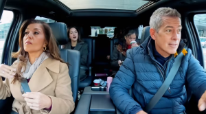 Transportation Secretary Sean Duffy in the driver's seat of a vehicle with his wife in the passenger seat and his kids in the back.